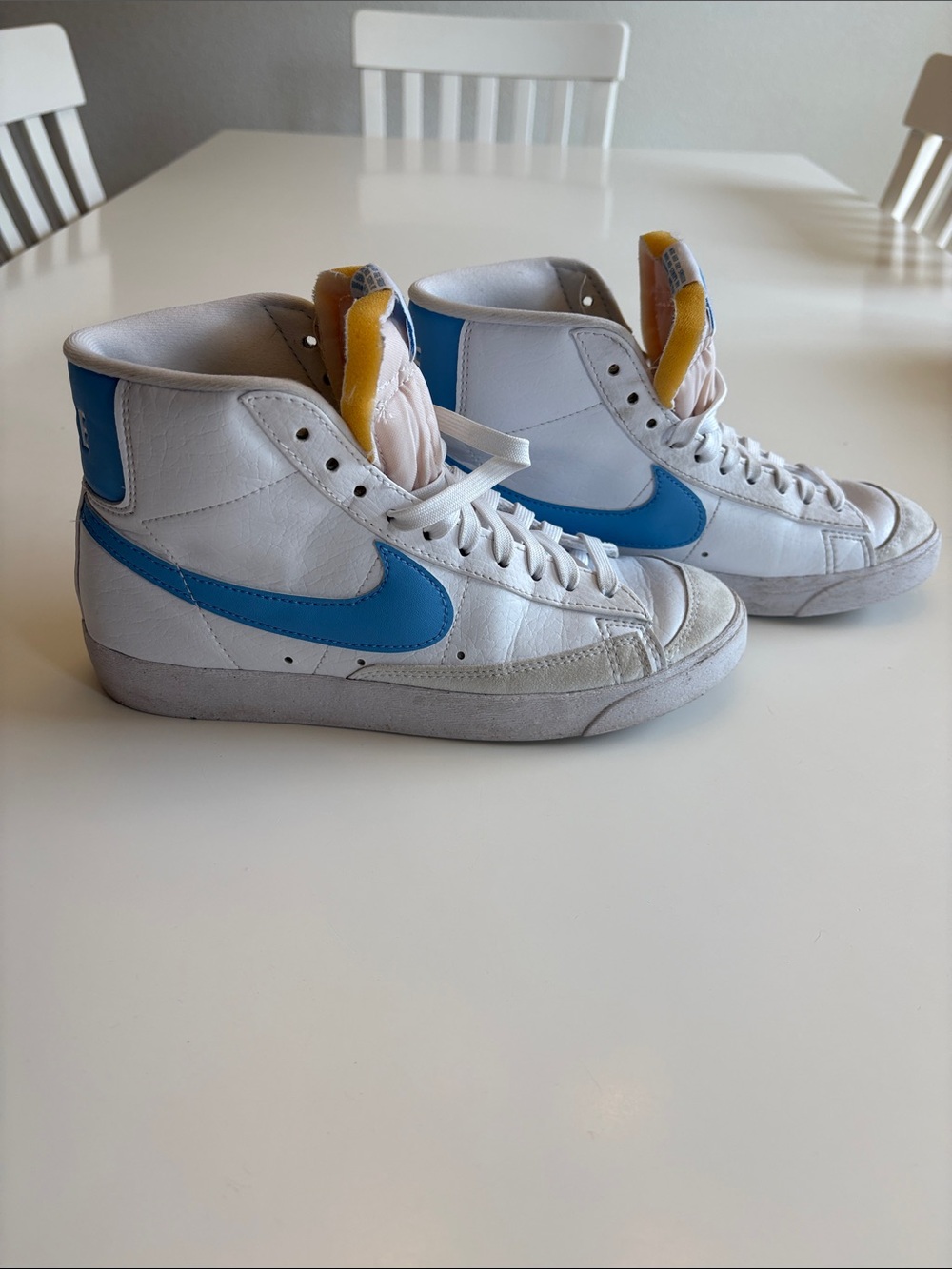Nike Blazers Women’s High-Top Sneakers in White and Light Blue Swoosh